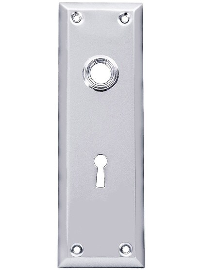 Stamped Brass New York Door Plate With Keyhole in Polished Chrome.